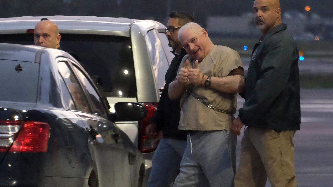 Former Panamanian President Ricardo Martinelli is escorted by US Marshals to an awaiting jet early morning June 11, 2018 at Opa Locka airport near Miami, FL. Martinelli is being extradited back to Panama on political espionage and corruption. Martinelli, 66, has another dozen cases pending that range from the misappropriation of public funds to the sale of pardons.