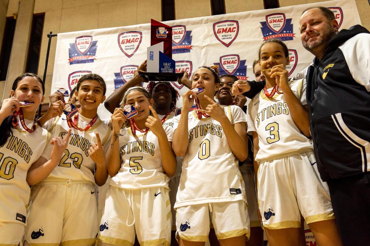 Miami Senior High School girl’s basket ball team reacts after defeating Miami Norland Senior High School 40-37 during the GMAC Basketball Finals at Miami-Dade College Kendall campus Gibson Gymnasium in Miami, Florida, on Friday, January 27, 2023.