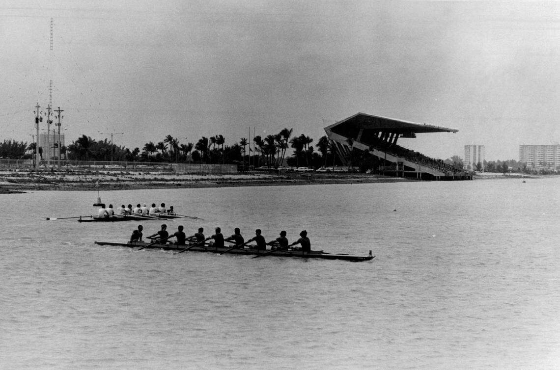 A rowing regatta runs through the waters of Biscayne Bay near Miami marine Stadium.