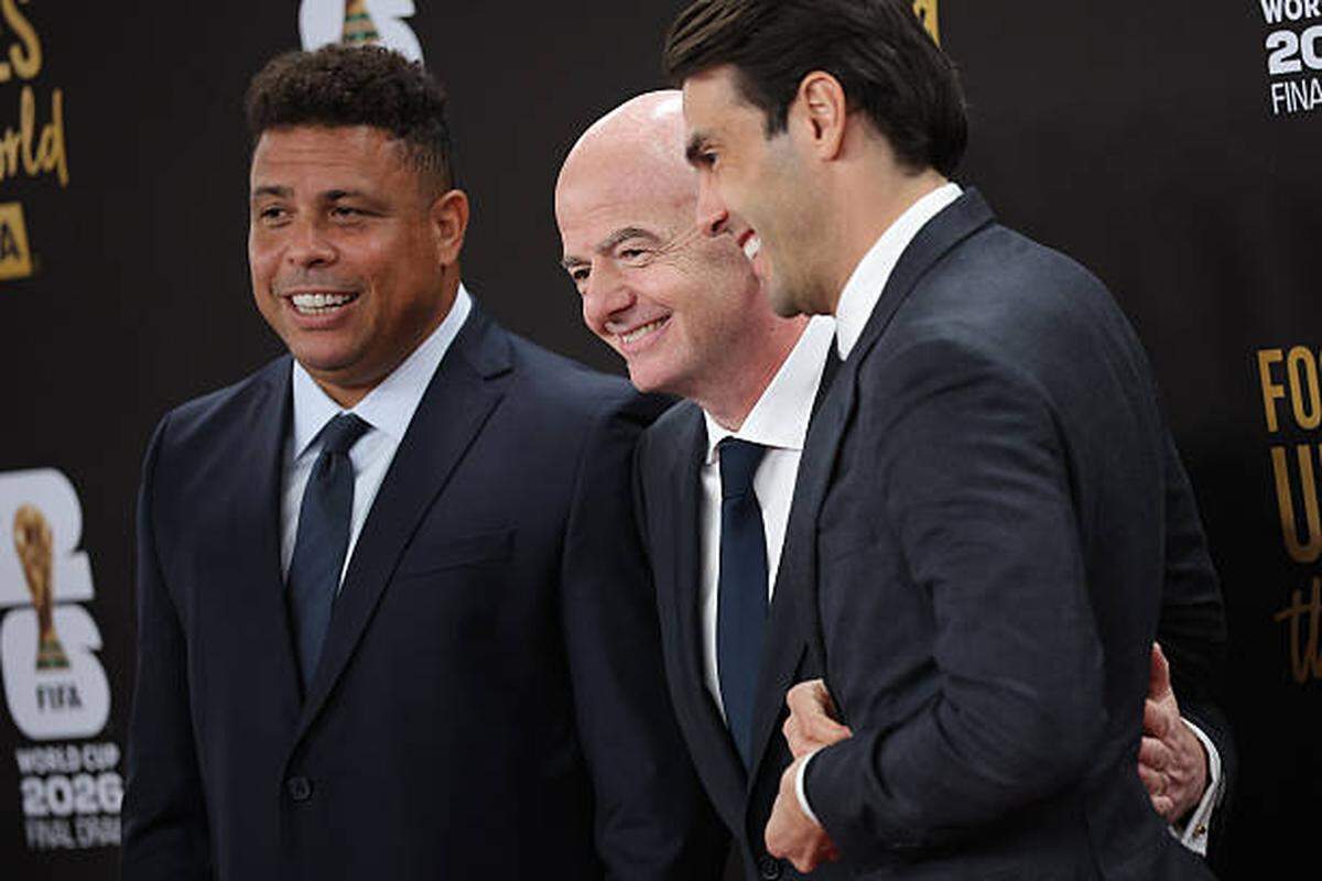 WASHINGTON, DC - DECEMBER 05: Gianni Infantino, President of FIFA, poses with Ronaldo and Kaka, FIFA legends on the red carpet prior to the FIFA World Cup 2026 Official Draw at John F. Kennedy Center for the Performing Arts on December 05, 2025 in Washington, DC.  (Photo by Kevin Dietsch/Getty Images)