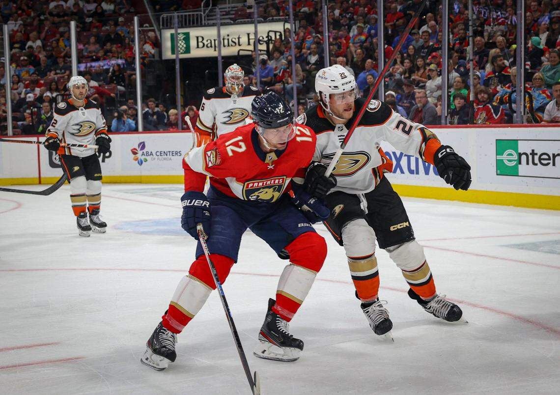 Florida Panthers center Eric Staal (12) and Anaheim Ducks defenseman Kevin Shattenkirk (22) try to keep each other away from the puck during the first period of a NHL game between the Florida Panthers and the Anaheim Ducks on Monday, Feb. 20, 2023, at FLA Live Arena in Sunrise, Fla.