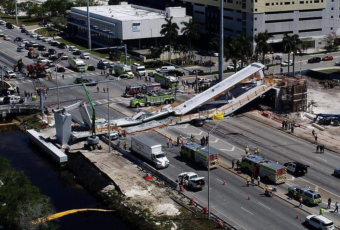 An aerial photo shows the fallen Florida International University bridge. It had developed cracks in the days before the collapse, which occurred on March 15, 2018.