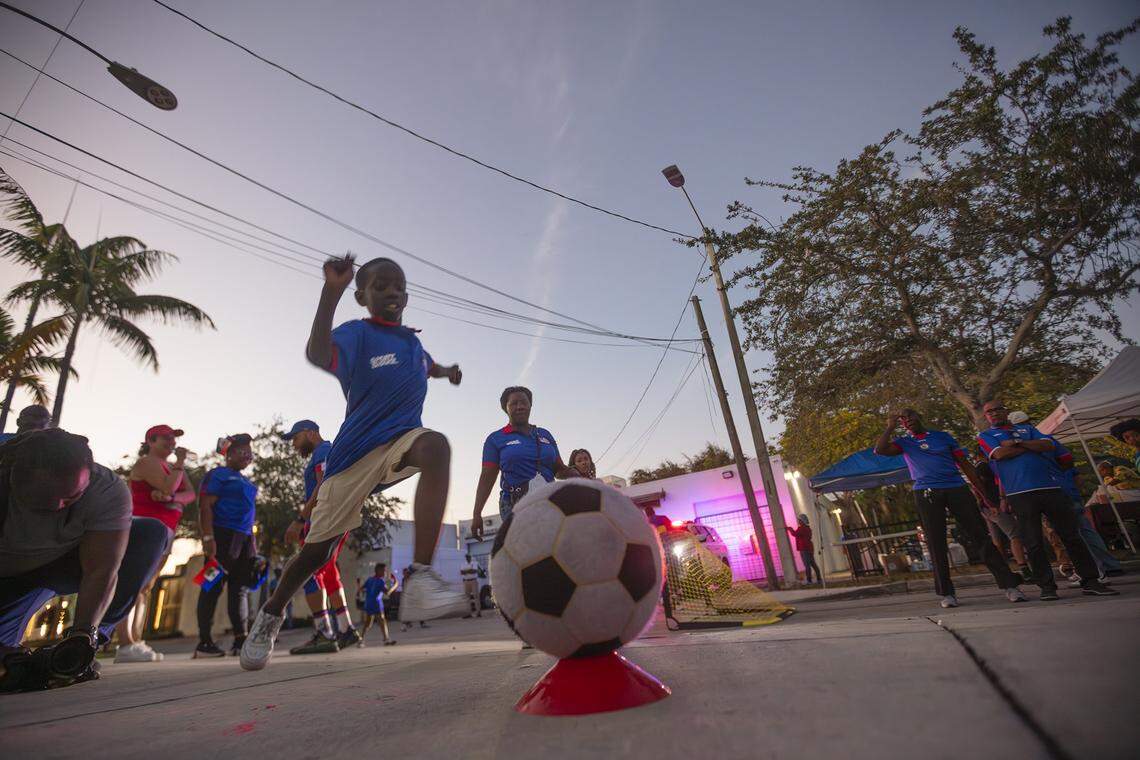 Darwens Romulus, 8 years old, kicks the ball during  Haitian World Cup Block Party at the Little Haiti Cultural Center in Little Haiti on Saturday, November 22, 2025.
