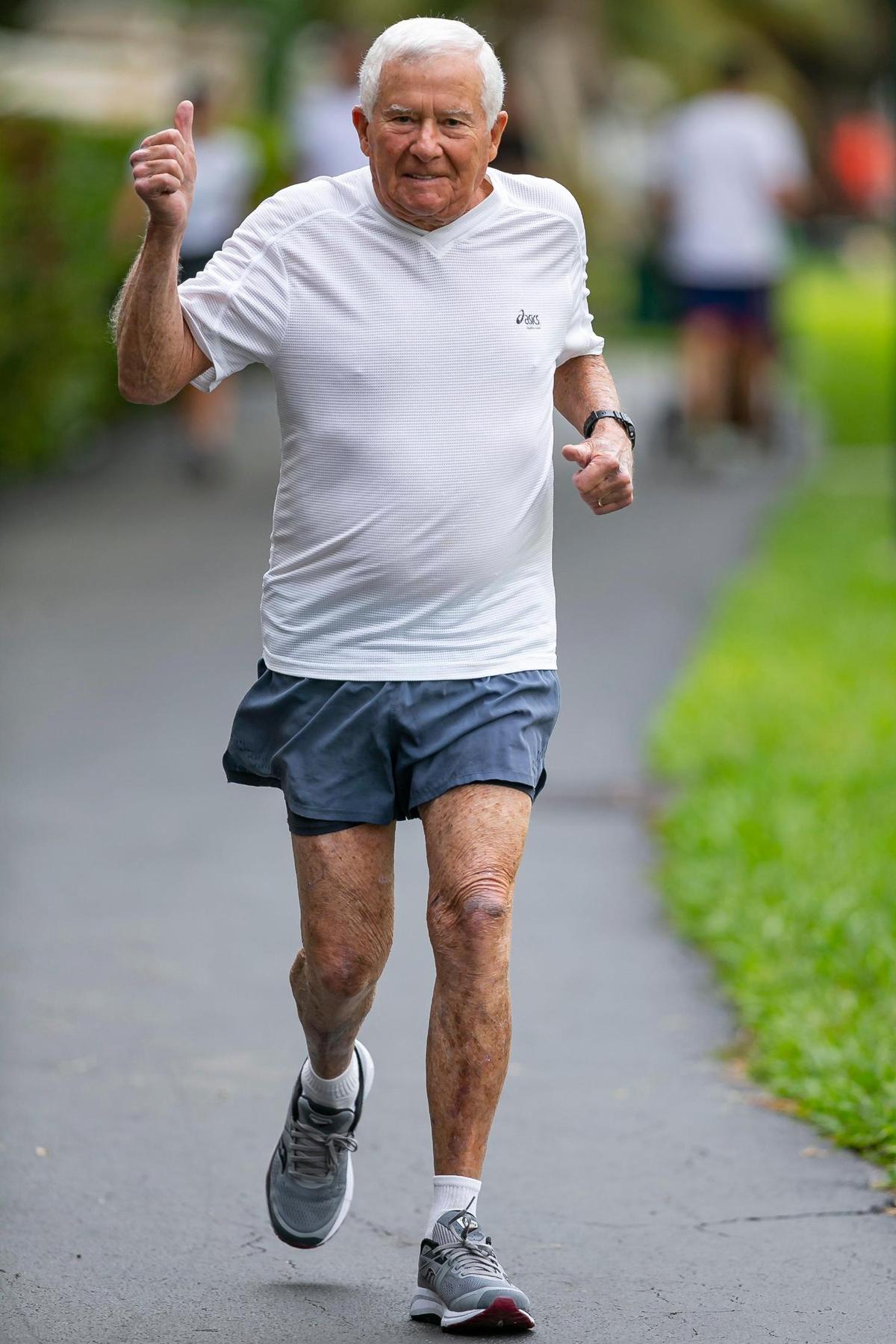 Lewis Ress, 91, jogs at the Don Soffer Exercise Trail in Aventura, Florida on Saturday, January 22, 2022. Ress, a former trial lawyer who still works and is involved in the South Florida community, will compete in the half marathon portion of the Miami Marathon on February 6, 2022.
