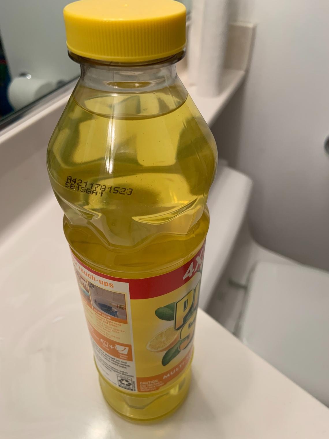 This bottle of Pine-Sol Multi-Surface Cleaner in Lemon Fresh Scent has the “A4” with the five-digit number under 22249.