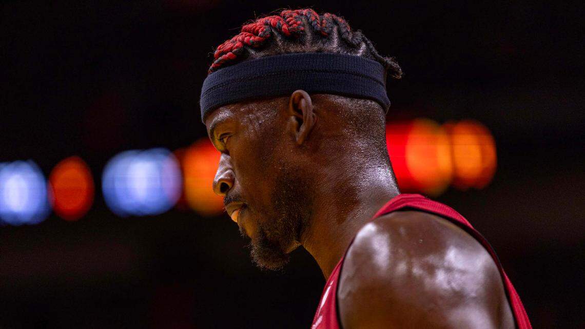 Miami Heat forward Jimmy Butler (22) reacts during the first half of an NBA game against the Milwaukee Bucks at Kaseya Center on Nov. 26, 2024, in Miami.