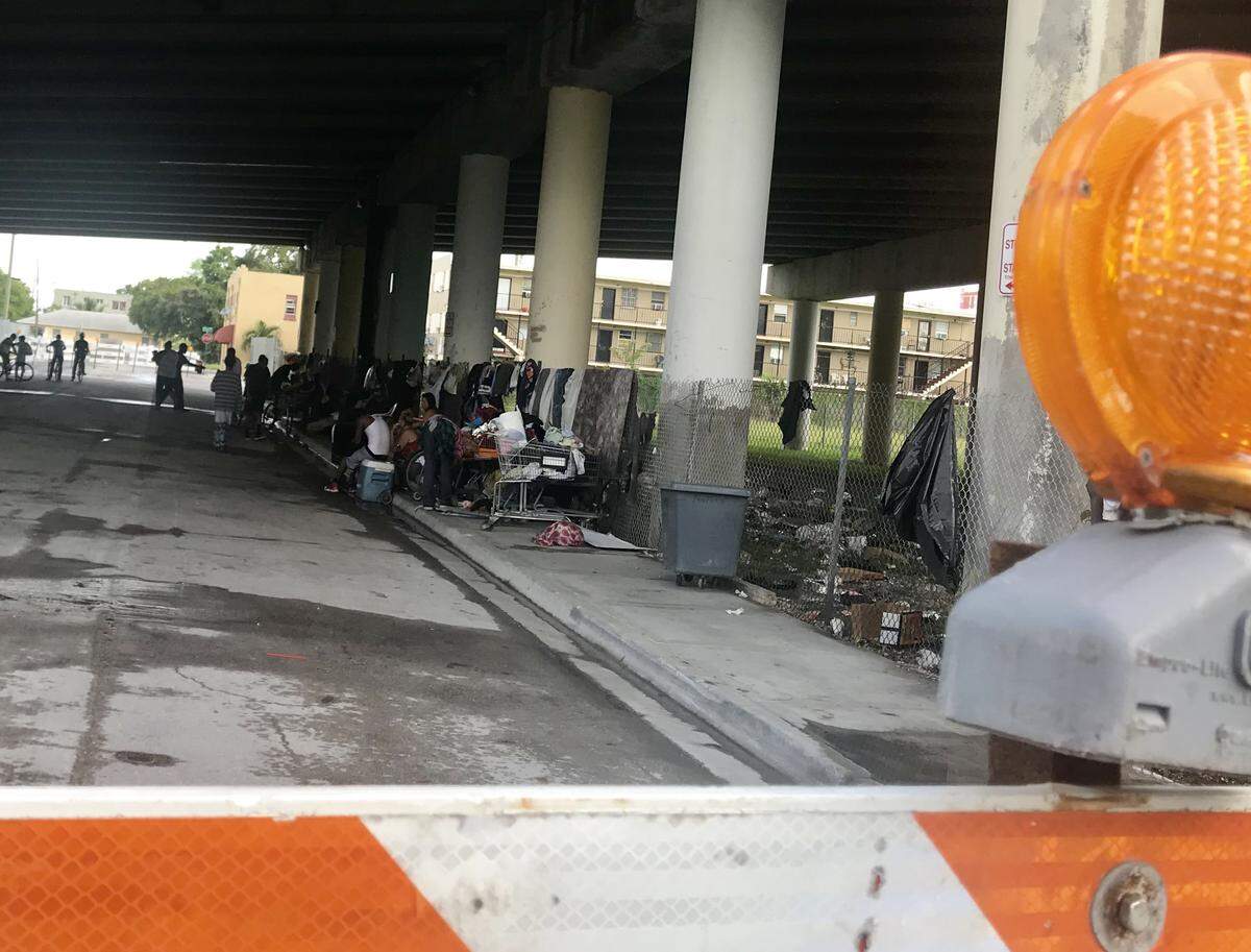 Miami officials have closed four streets under the 836 expressway in Overtown as health officials investigate the spread of HIV and hepatitis C.