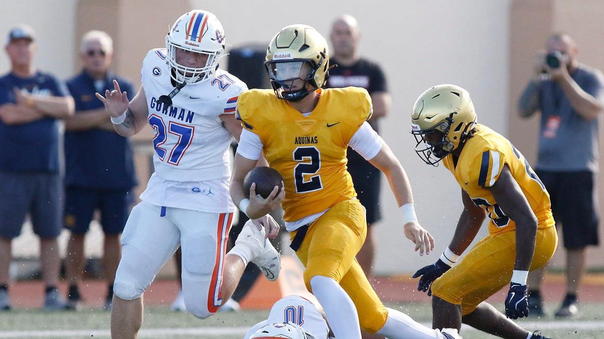 St. Thomas Aquinas quarterback Andrew Indorf (2) carries the ball against Las Vegas Bishop Gorman during football game on Saturday, August 24, 2024 at St. Thomas Aquinas HS in Fort Lauderdale. Andrew Uloza / for Miami Herald