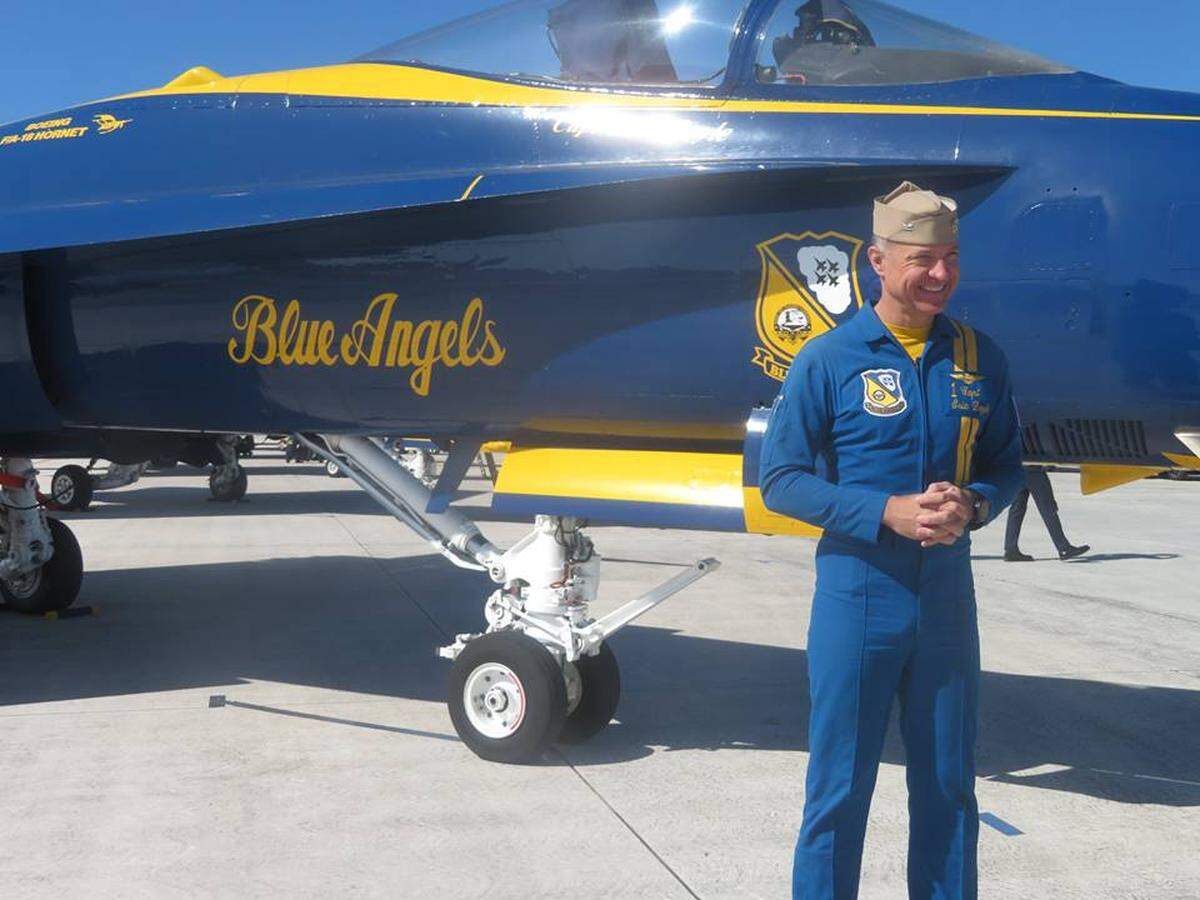 Eric Doyle, Commanding Officer and Flight Leader of the Blue Angels, poses in front of one of the team’s jets at Naval Air Station Key West on Thursday, March 28, 2019.