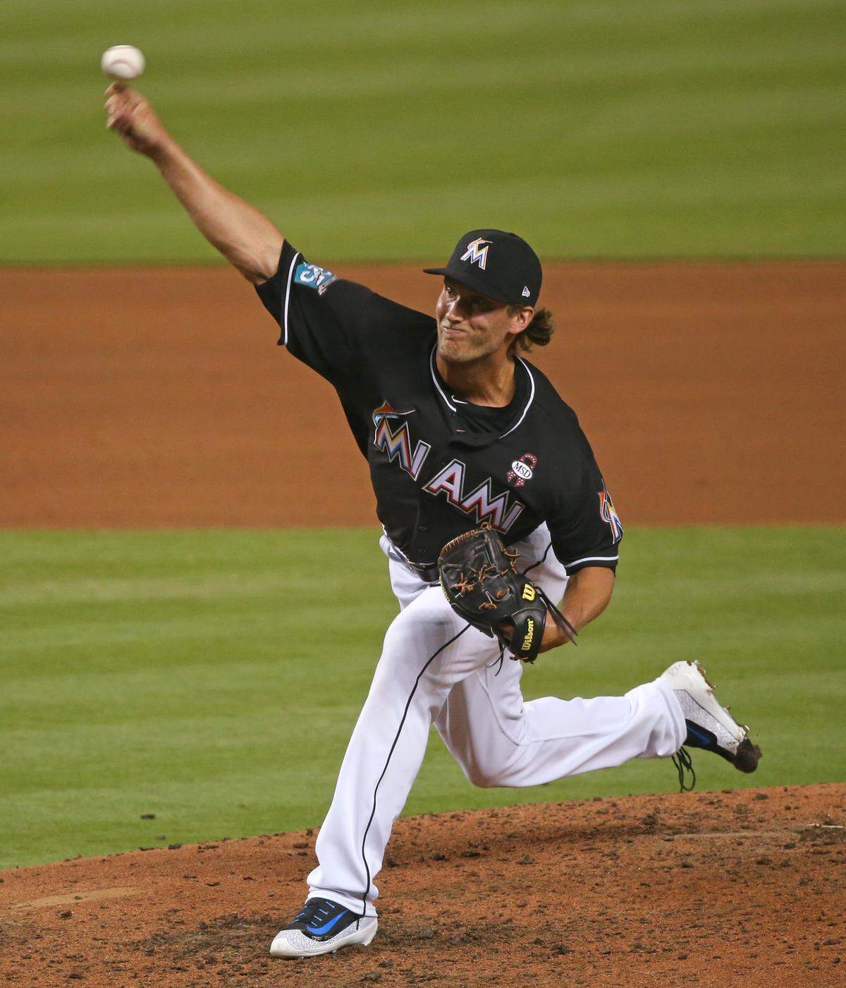 Miami Marlins pitcher Drew Steckenrider pitches during the seventh inning of a Major League Baseball game against the Chicago Cubs at Marlins Park on Friday, March 30, 2018 in Miami.