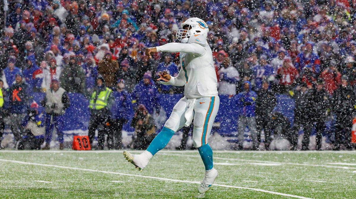 Miami Dolphins quarterback Tua Tagovailoa (1) throws a pass during fourth quarter of an NFL football game against the Buffalo Bills at Highmark Stadium on Saturday, December 17, 2022 in Orchard Park, New York.