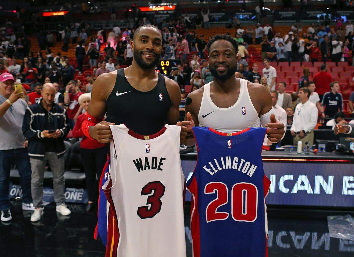 Miami Heat guard Dwyane Wade (3) and Detroit Pistons guard Wayne Ellington (20) exchange jerseys after an NBA basketball game at AmericanAirlines Arena on Wednesday, March 13, 2019 in Miami. Heat won 108-74.