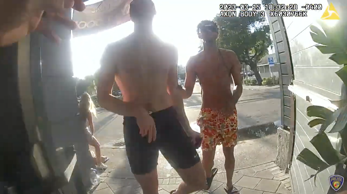 California State University Northridge basketball player De’Sean Eikens (right) was charged with punching an officer outside a Fort Lauderdale bar, police say.