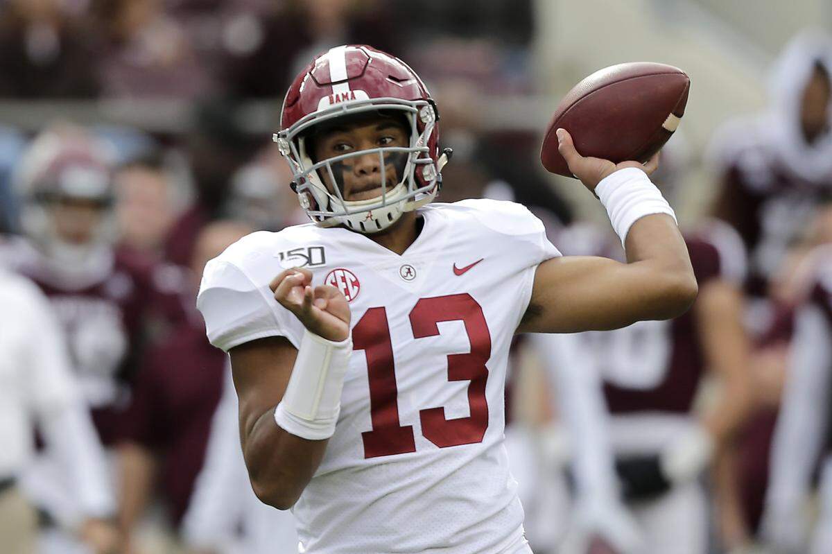 Alabama quarterback Tua Tagovailoa (13) passes downfield against Texas A&M during the second half of an NCAA college football game, Saturday, Oct. 12, 2019, in College Station, Texas.