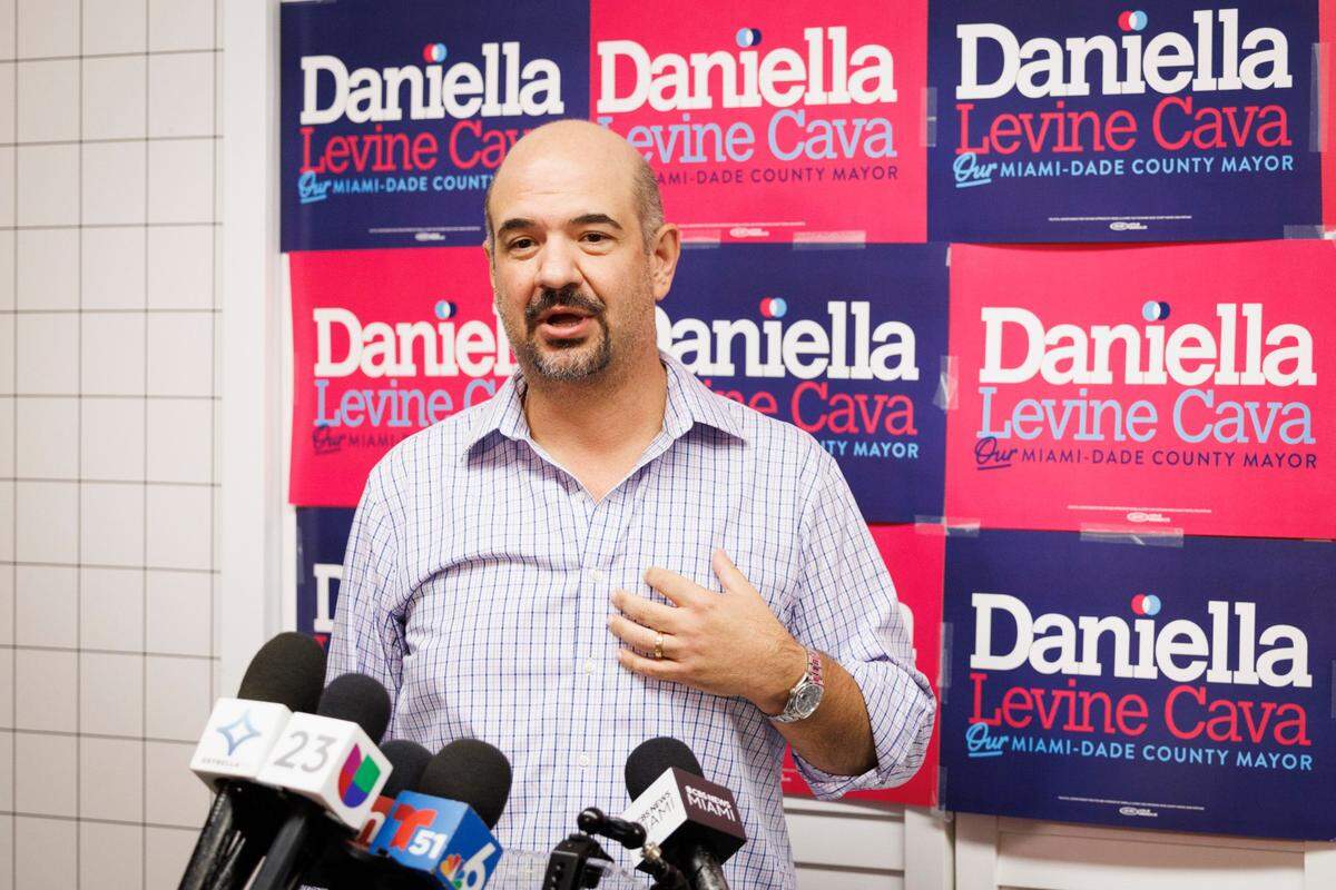 Christian Ulvert, head of Levine Cava’s campaign and EDGE Communications president, speaks during a press conference with re-elected Miami-Dade Mayor Daniella Levine Cava on Wednesday, Aug. 21, 2024, at her campaign office in Miami.