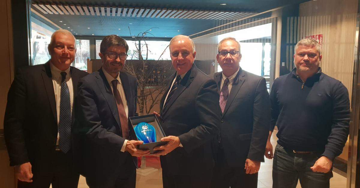 A photo released Tuesday, Jan. 8, 2019, by Miami-Dade County shows Mayor Carlos Gimenez, center, exchanging a gift with Alvaro Rodriguez Paena, director of Spain’s state ports authority. Also pictured, from left, are Miami-Dade ports chief Juan Kuryla, aviation director Lester Sola, and Magec Montesdeoca, another Spanish ports official.