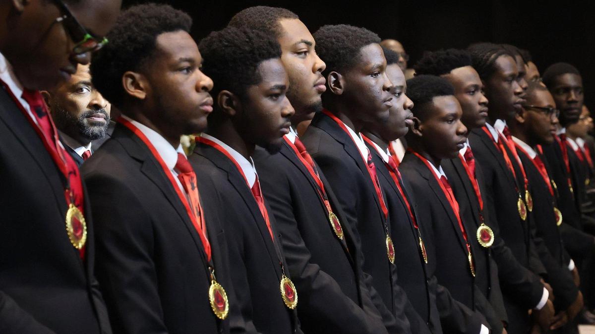 Members of the Wilson Scholars Class of 2023 stand facing the audience wearing their medallions after the processional and medallion ceremony. The 5000 Role Models of Excellence Project celebrated its 30th Anniversary with a keynote address by Douglas Emhoff, the Second Gentleman of the United States, who is married to the first female vice president, as the organization honored 2023 Wilson Scholars, Philanthropic Mentors, and inducted Models of Excellence during the Annual Dr. Martin Luther King Jr. Scholarship Breakfast on Monday, Jan. 16, 2023, at the Miami Beach Convention Center.