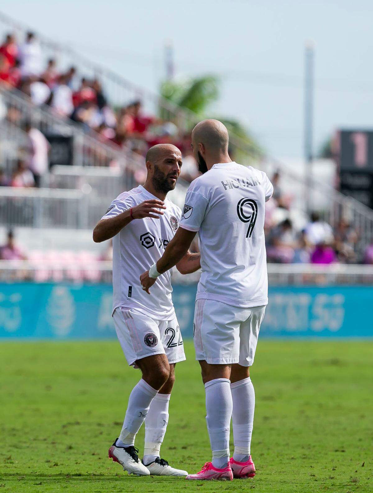 Inter Miami forward Federico Higuain (22) hugs his brother, forward Gonzalo Higuain (9), during the second half of their MLS soccer match against New York City FC at DRV PNK Stadium on Saturday, October 30, 2021, in Fort Lauderdale, Florida. This match was Federico’s last home game before retiring from Major League Soccer at the conclusion of this season.