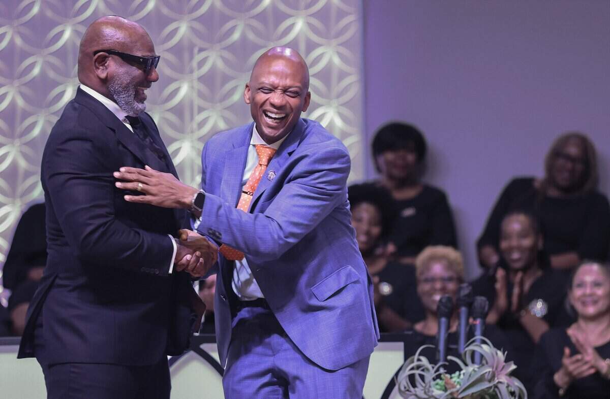 Pastor Arthur Jackson, III, left, embraces Miami-Dade Commissioner Oliver G. Gilbert, III, after his official announcement of his formal congressional run during a public announcement on Sunday, June 7, 2026, at Antioch Missionary Baptist Church in Miami Gardens, Florida.