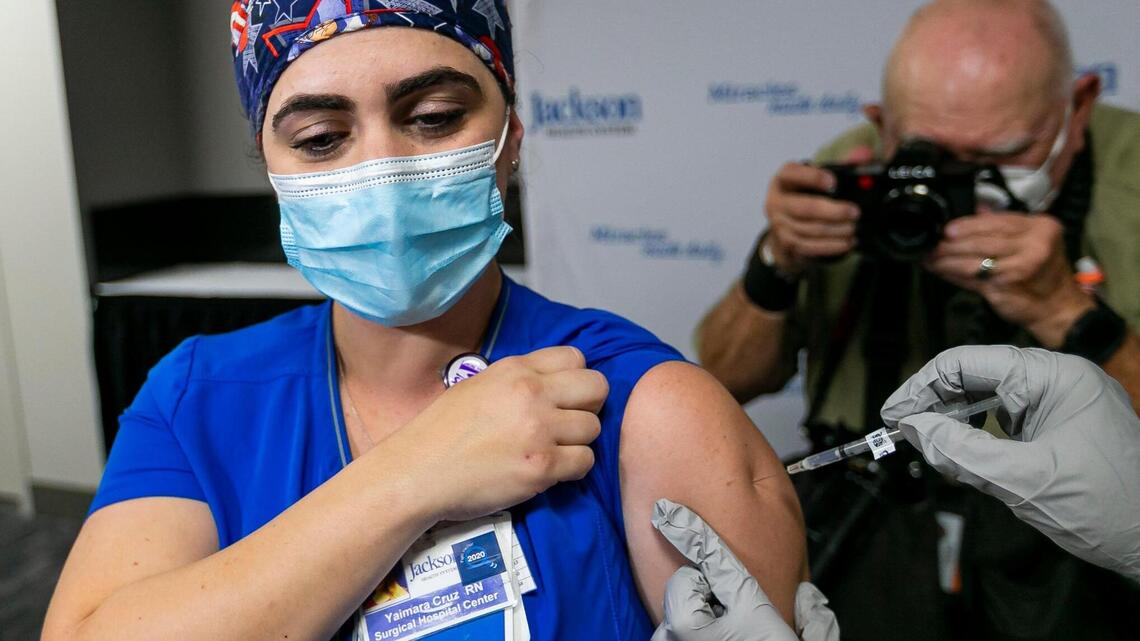 ‘Here we finally are.’ First healthcare workers in Miami-Dade receive COVID-19 vaccine.