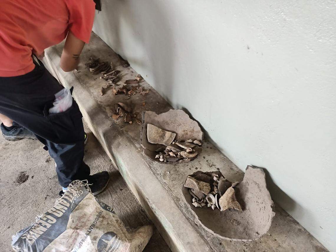 Artifacts and remains found at the burial site.