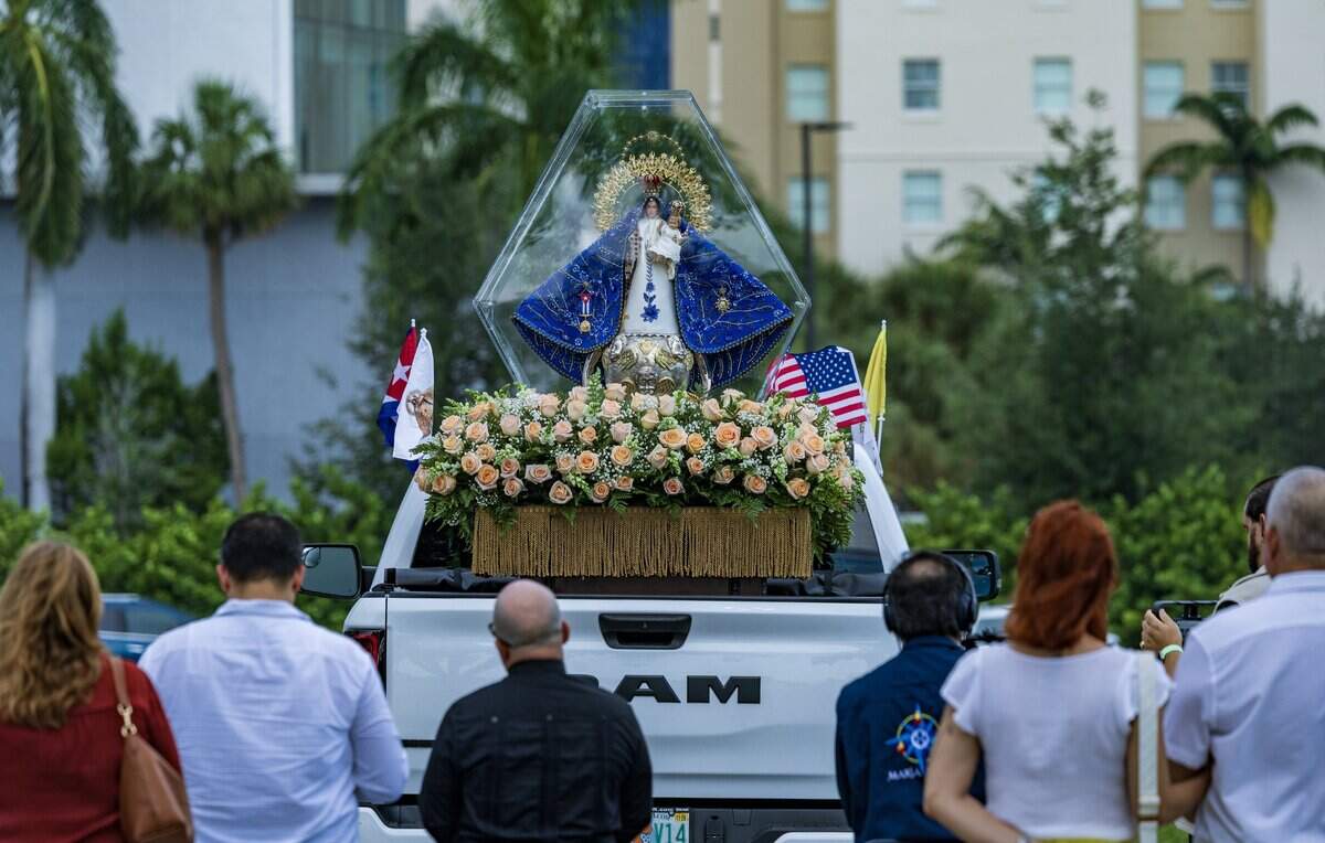 Parishioners attended a prayer at the Cuban Memorial Monument as a vehicle procession arrived with the blessed statue of Our Lady of Charity ahead of the celebration of a Solemn Mass celebrating the 65th Anniversary of the Arrival of the Image of Our Lady of Charity in Miami, presided over by his Reverend Thomas Wenski, Archbishop of Miami celebrated at the Miami-Dade Fair & Exposition, in West Miami, on Tuesday September 08, 2026.