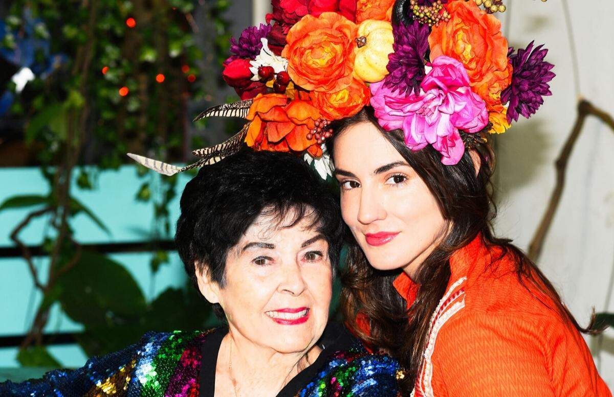 Louise Alvarez, left, and her granddaughter Monique remade the popular English Christmas carol, “The 12 Days of Christmas,” Hialeah-style to spread seasonal cheer and play off their Cuban roots in “Los 12 Dias de Navidad de Abuela (en Hialeah)” in December 2019. Monique has since co-created and is writing a proposed sitcom for IMDb/Amazon Studios called “Hialeah: Dade F*ckin County.”