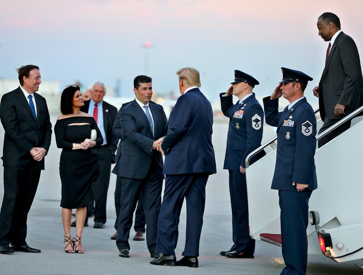 Florida Speaker of the House Jose Oliva of Miami Lakes greets President Donald Trump, as he arrives on Air Force One at the Fort Lauderdale-Hollywood International Airport. At left is Senate President Bill Galvano. Trump later attended the Republican Party of Florida’s Statesman’s Dinner at the JW Marriott Miami Turnberry Resort & Spa in Aventura and the Israeli-American Council Summit 2019 at The Diplomat Beach Resort in Hollywood on Saturday, December 7, 2019.