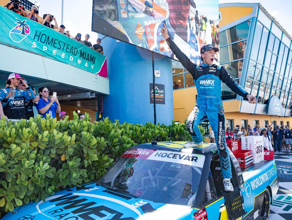 Carson Hocevar (42) celebrates after winning the Baptist Health Cancer Care 200 NASCAR Craftsman Truck Series playoff race at the Homestead-Miami Speedway on Saturday, Oct. 21, 2023, in Homestead, Fla.