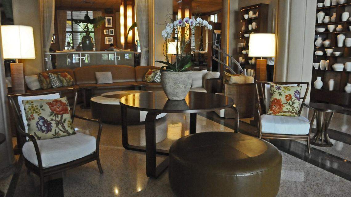 The entrance of the Raleigh Hotel, which Tommy Hilfiger sold for $103 million Wednesday to a group of investors from Germany, New York and Turkey.