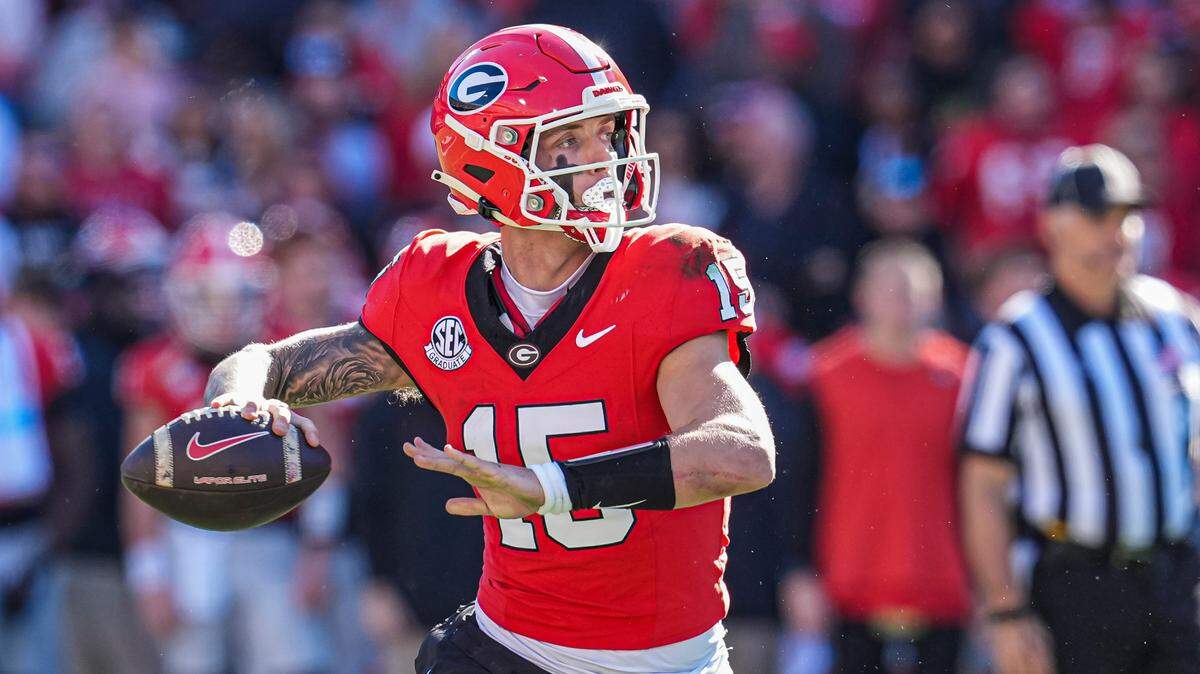 Nov 23, 2024; Athens, Georgia, USA; Georgia Bulldogs quarterback Carson Beck (15) in action against the Massachusetts Minutemen at Sanford Stadium.