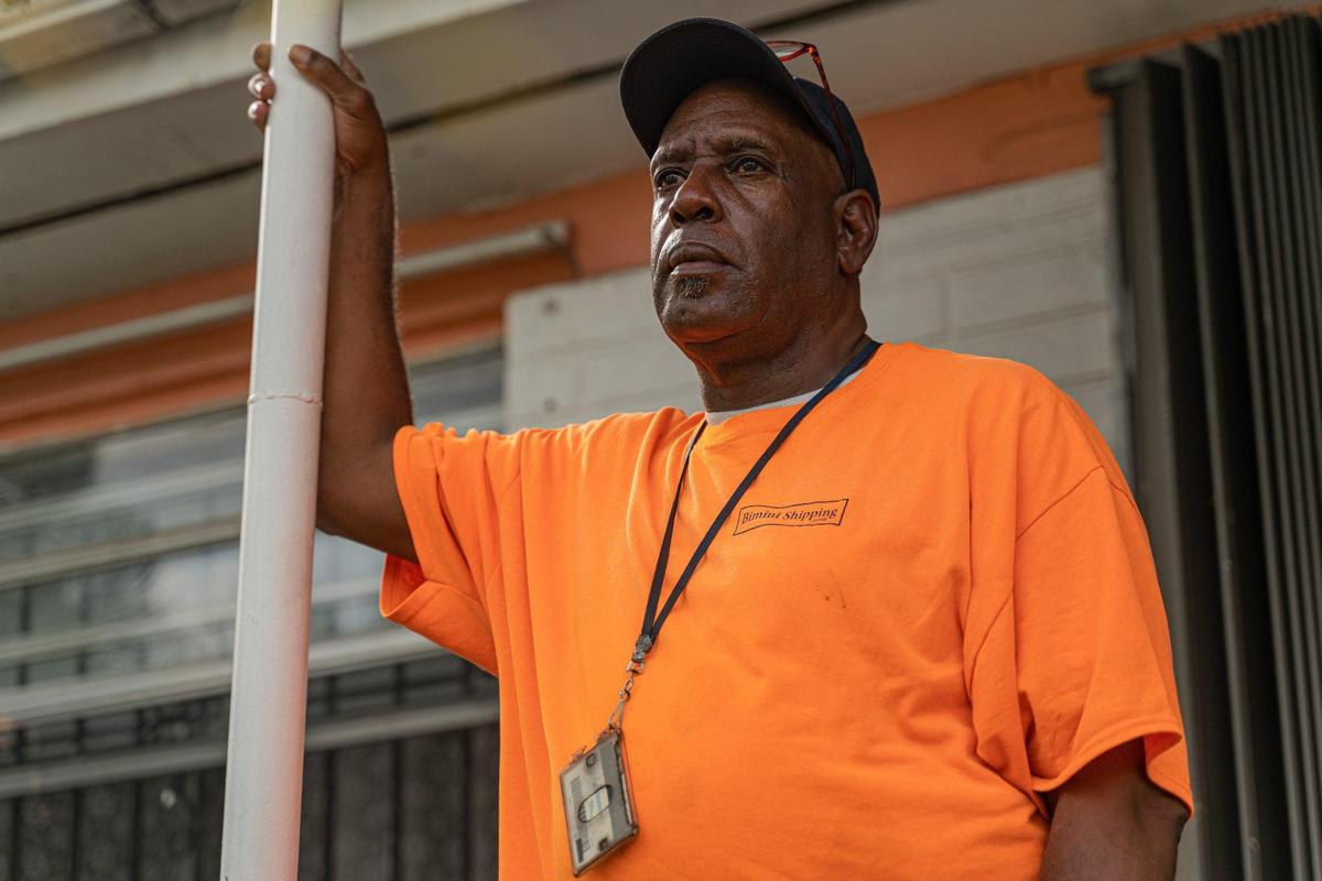 Home owner Darryl Williams poses for a portrait in front of his house in outside of Miami on Thursday, December 22, 2022.
