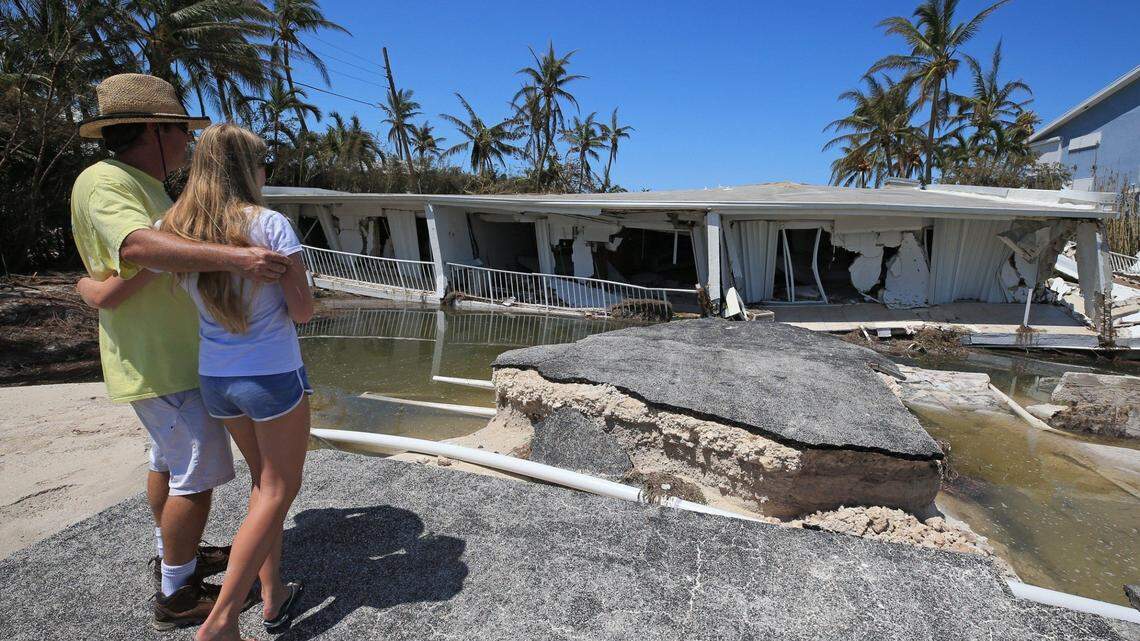 In September, Hurricane Irma made its first Florida landfall near Big Pine, causing this three-story Sandy Cove condo on Lower Matecumbe to collapse.  A day after the storm, Mike Gilbert and his daughter Brook Gilbert, 15, surveyed the ruins of his father's unit.