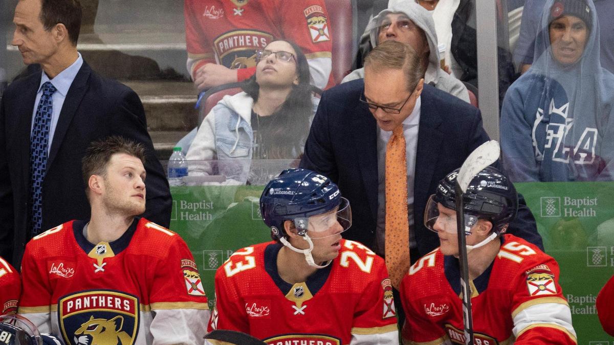 Florida Panthers Head Coach Paul Maurice talks to Florida Panthers centers Carter Verhaeghe (23) and Anton Lundell (15) during the third period of a game on Tuesday, March 26, 2024, at Amerant Bank Arena in Sunrise, Fla.