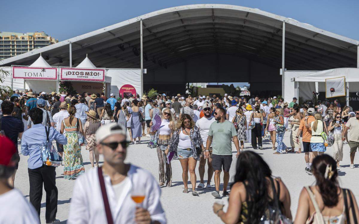 People attend the Goya Foods' Grand Tasting Village during the Food Network South Beach Wine & Food Festival on Saturday, Feb. 21, 2026, in Miami Beach, Fla.