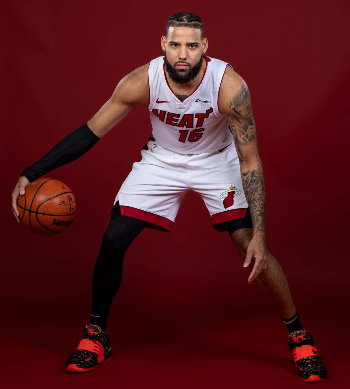 Miami Heat forward Caleb Martin (16) is photographed during team Media Day at the Kaseya Center on Monday, Oct. 2, 2023, in Miami, Fla.
