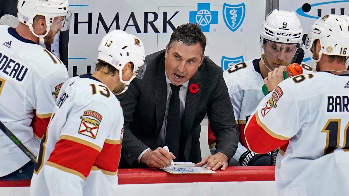 Florida Panthers interim coach Andrew Brunette, center, gives instructions during overtime of the team’s NHL hockey game against the Pittsburgh Penguins in Pittsburgh, Thursday, Nov. 11, 2021. The Penguins won in a shootout, 3-2. (AP Photo/Gene J. Puskar)
