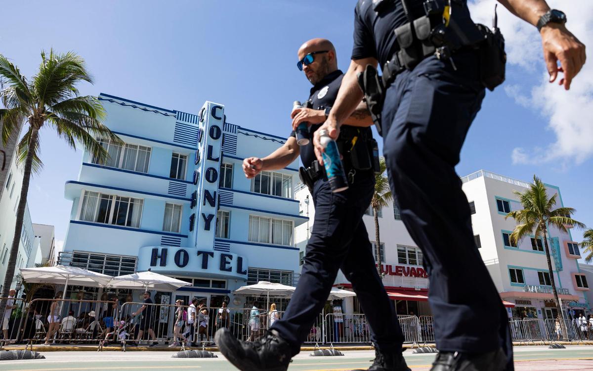 Police officers patrol Ocean Drive during spring break on Friday, March 15, 2024, in Miami Beach.&nbsp;