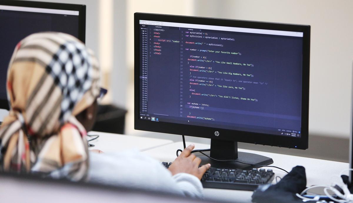 Gaelle Charlet, 16, works on a coding challenge that is part of a web development class at the Big Brothers Big Sisters of Greater Miami campus Monday, July 9, 2018.