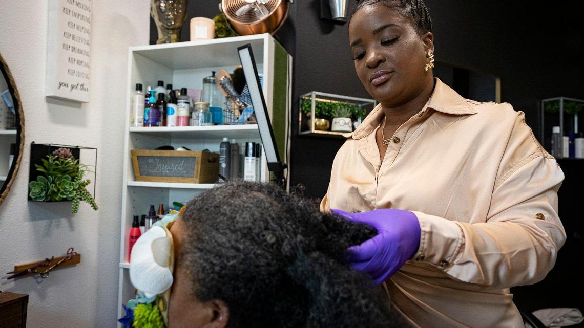 Hadassa Felix, a Haitian American hair stylist and entrepreneur, has a growing clientele for her hair detangling and straightening services and a big social media following. She operates Love 518 salon in Little Havana.
