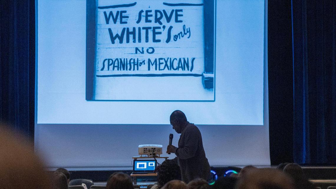 Marvin Dunn, a Black history author, FIU Emeritus Professor and leader of the Center for Racial Justice. Displayed several historic images as he speaks during his presentation on The Civil Rights Movement in Florida to U.S. history students and seventh grade civics students at the Palmetto Middle School, in Pinecrest, on Thursday February 01, 2024.