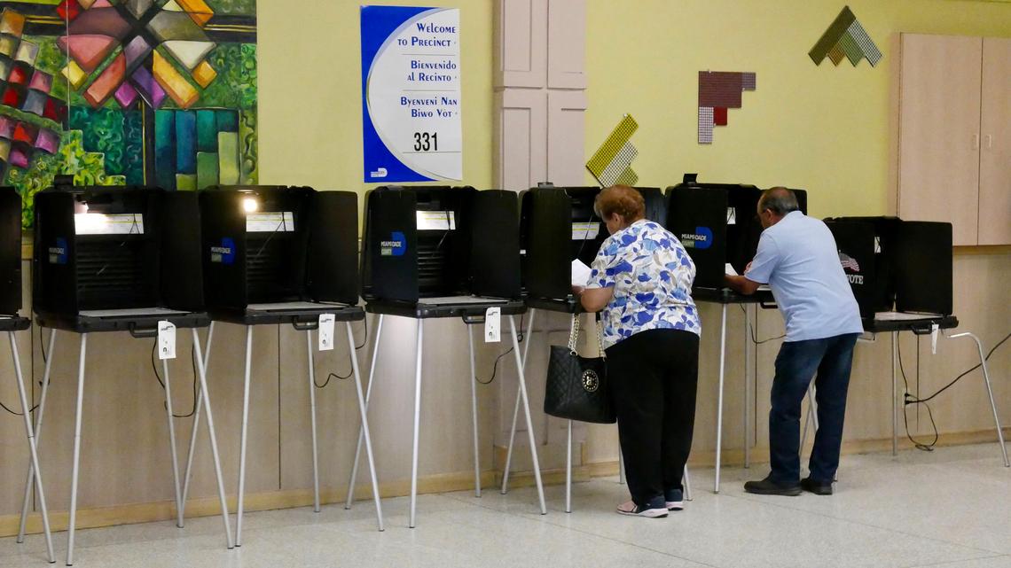 Voters cast ballots in the Hialeah municipal election shortly after the polls opened Tuesday morning.