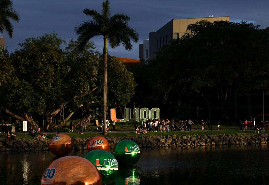 People walk around during the University of Miami Centennial celebration on Tuesday, April 8, 2025, around the Lakeside Patio at the University of Miami’s Coral Gables campus.