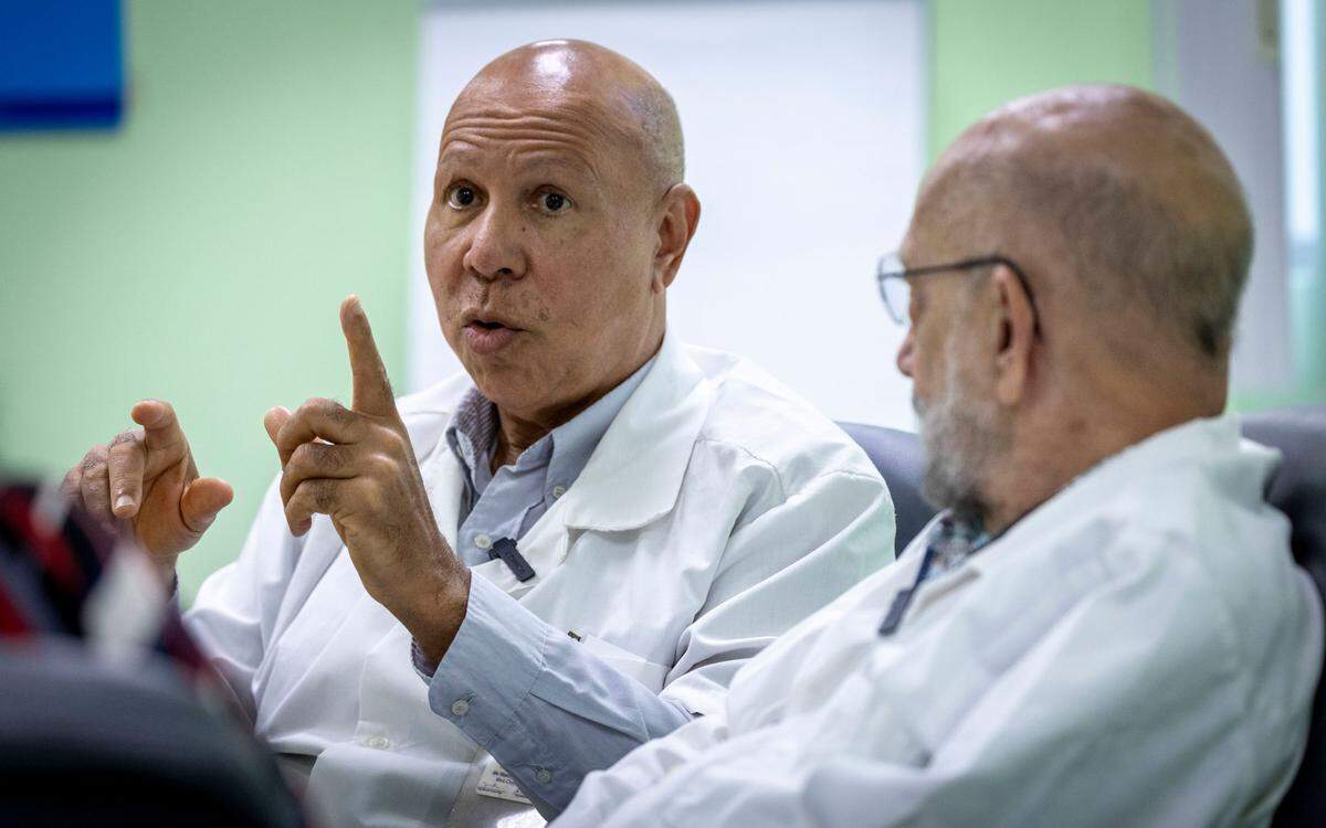 From left, Dr. Harry Theodore, an obstetrician-gynecologist who opened a rape-treatment center more than 20 years ago at the GHESKIO site in Port-au-Prince, Haiti, and Dr. Bernard Liautaud, a co-founder of the medical clinics and HIV/AIDS research center.