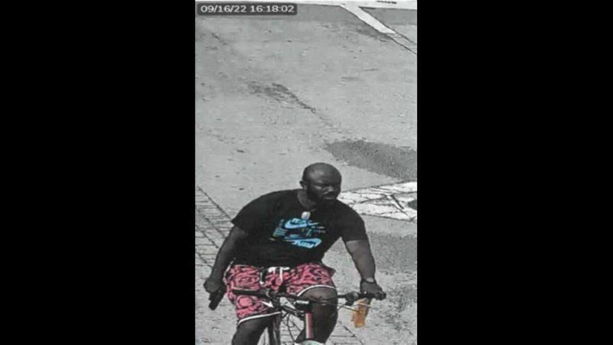 Surveillance camera still from the arrest affidavit that police say shows Jermaine Shennett on his bike with a handgun near where someone fired at a Lauderhill Fire Rescue truck.