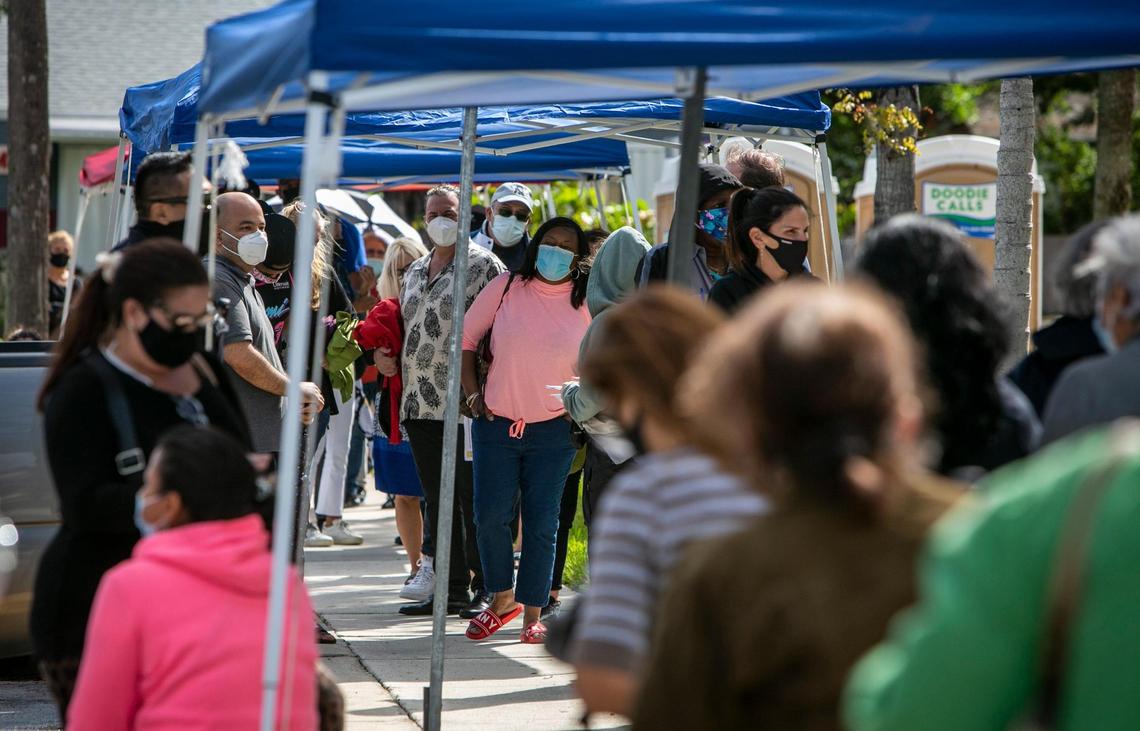 Miami, Florida, March 11, 2021 - People waiting to get vaccinated for COVID-19 in front of the Allen Park Community Center, 1770 NE 162nd Street, North Miami Beach . Two new satellite federal vaccination sites opened on Thursday. The other one is in Miami Springs.