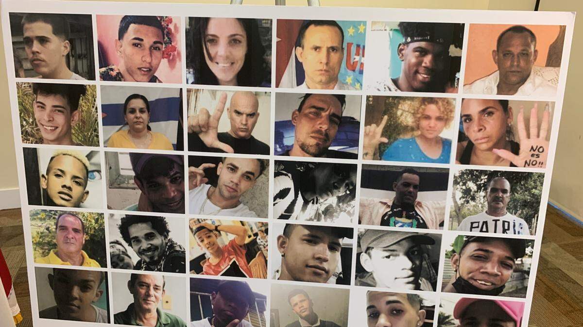 A poster with pictures of Cuban political prisoners was displayed during a Doral news conference on Monday, July 11, 2022, a year after Cuba saw mass protests for freedom.