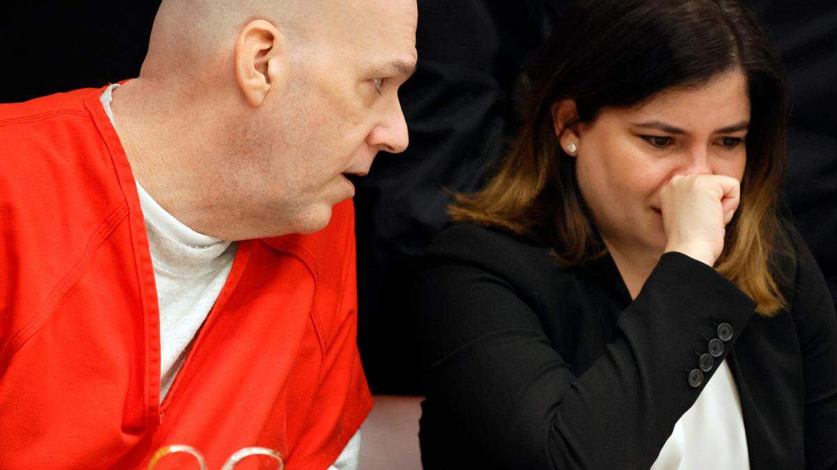 Howard Steven Ault speaks with defense attorney Lien Lafargue, appearing to offer words of comfort as she cries after the jury recommended the death penalty in his double murder trial at the Broward County Courthouse in Fort Lauderdale on Thursday, Feb. 22, 2024. Ault was convicted in 1999 of the 1996 murders of DeAnn Emerald Mu’min, 11, and Alicia Sybilla Jones, 7. The same jury later recommended his execution but Ault was granted a new penalty phase after the Supreme Court struck down Florida’s death penalty process as unconstitutional in 2016. (Amy Beth Bennett / South Florida Sun Sentinel)