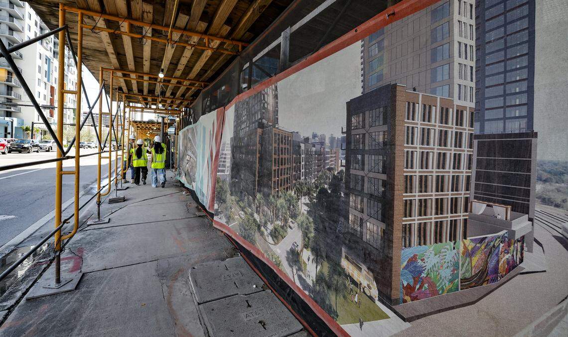 An artist rendering can be viewed along the sidewalk at FAT Village, a mixed use residential, arts district, retail and office space under construction in Fort Lauderdale, Florida, on Thursday, September 25, 2025.