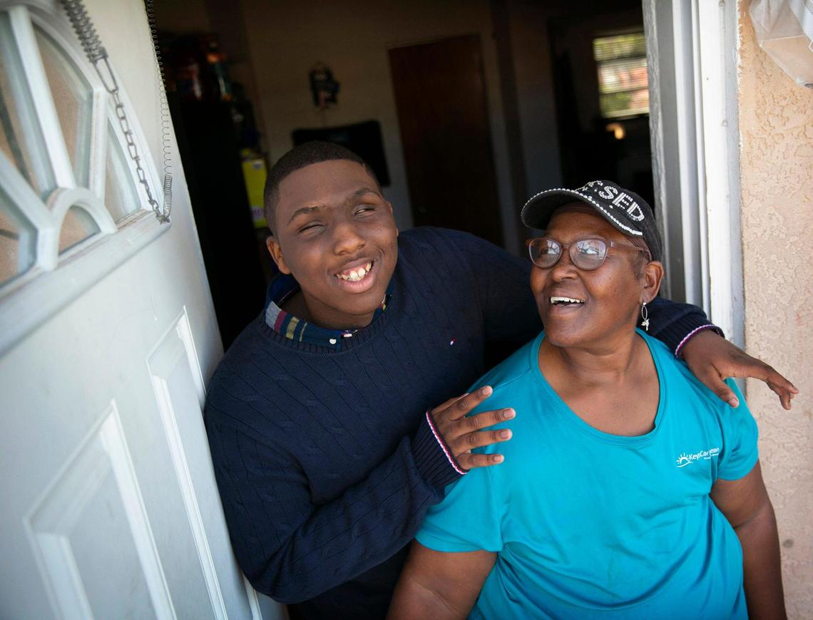 16-year-old Jayden Ferrell, shares a laugh with his grandmother, Mary Crawford, in her Key Largo home on Dec. 15, 2021. Ferrell moved in with his grandmother to help look after her when she was being treated for cancer. Ferrell, who was born blind, is a charismatic teen, theater buff, music lover and aspiring lawyer.